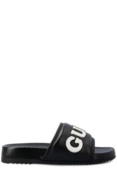 gucci embossed slides